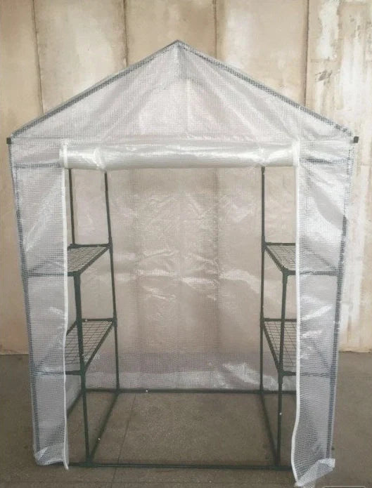 Green PE mesh greenhouse stand with steel frame measuring 143cm long by 73cm wide by 195cm tall
