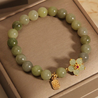 Women's casual bracelet with a grey jade stone set in an alloy metal band.