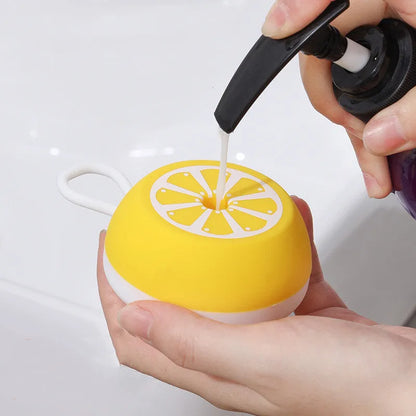 Yellow silicone pet bath brush with 3D massage head for dog and cat grooming measuring 102x70x46mm