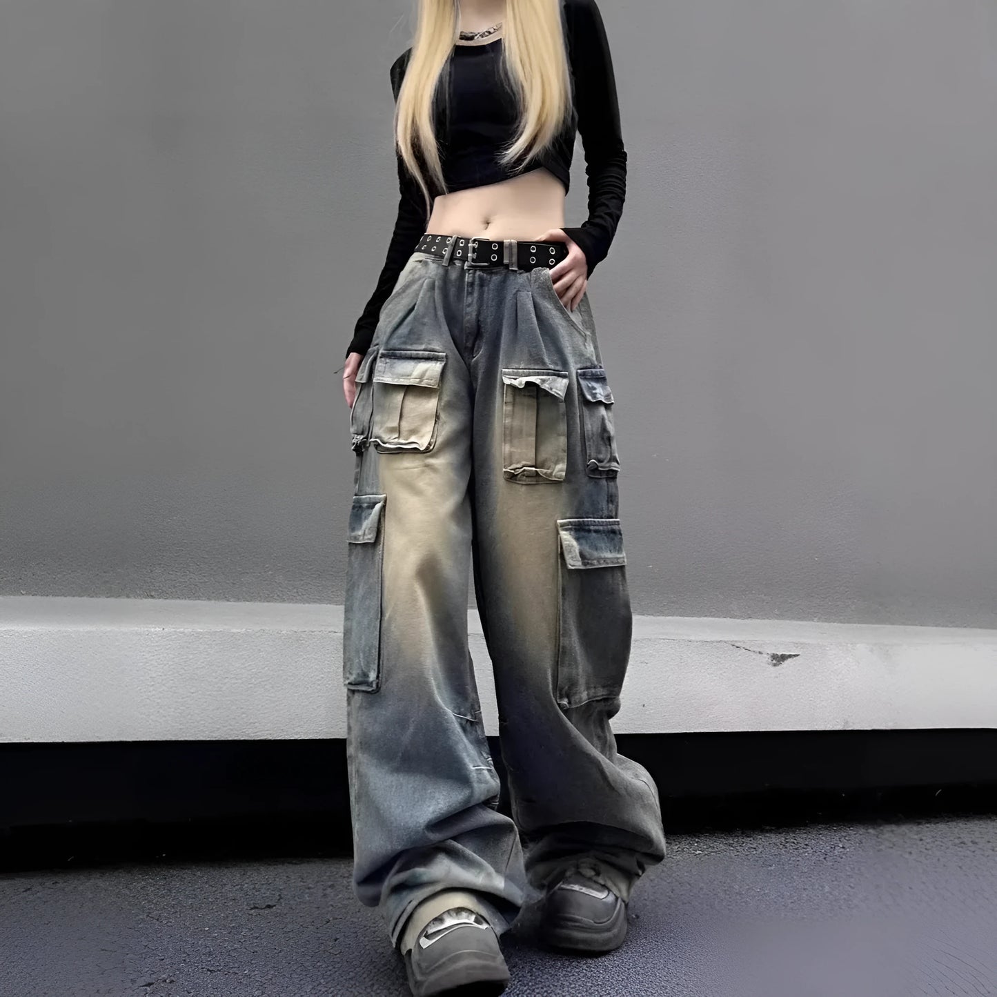 Loose multi-pocket distressed denim pants in light blue and black on a size chart.