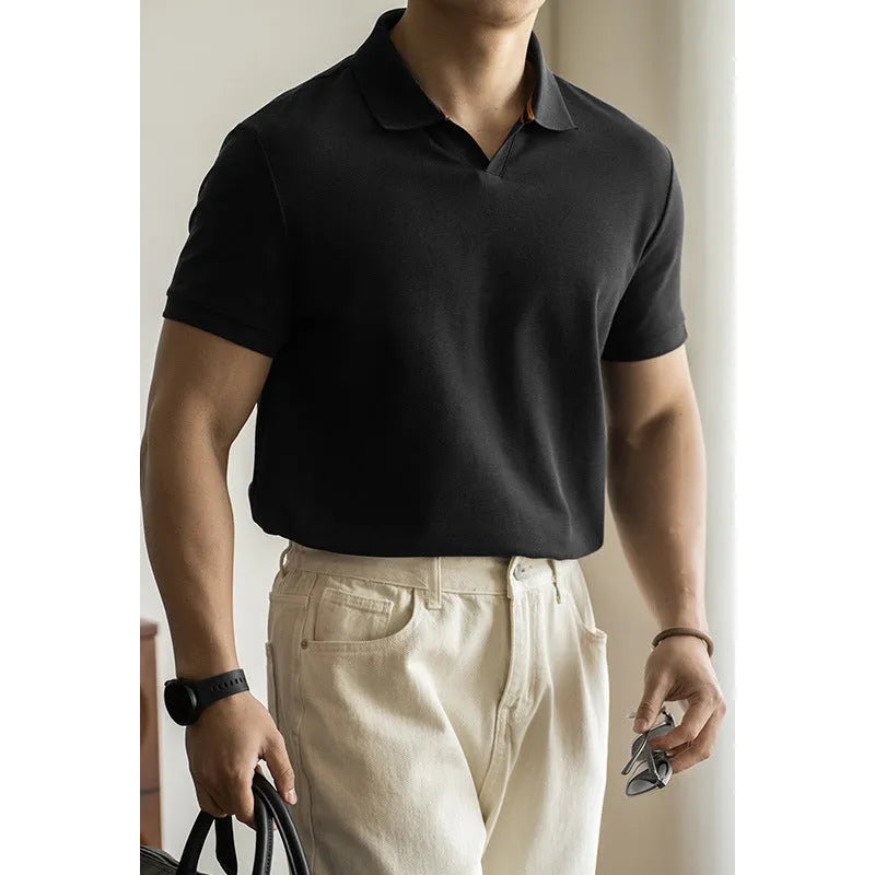 Light blue cotton polyester short-sleeved polo shirt on a hanger.