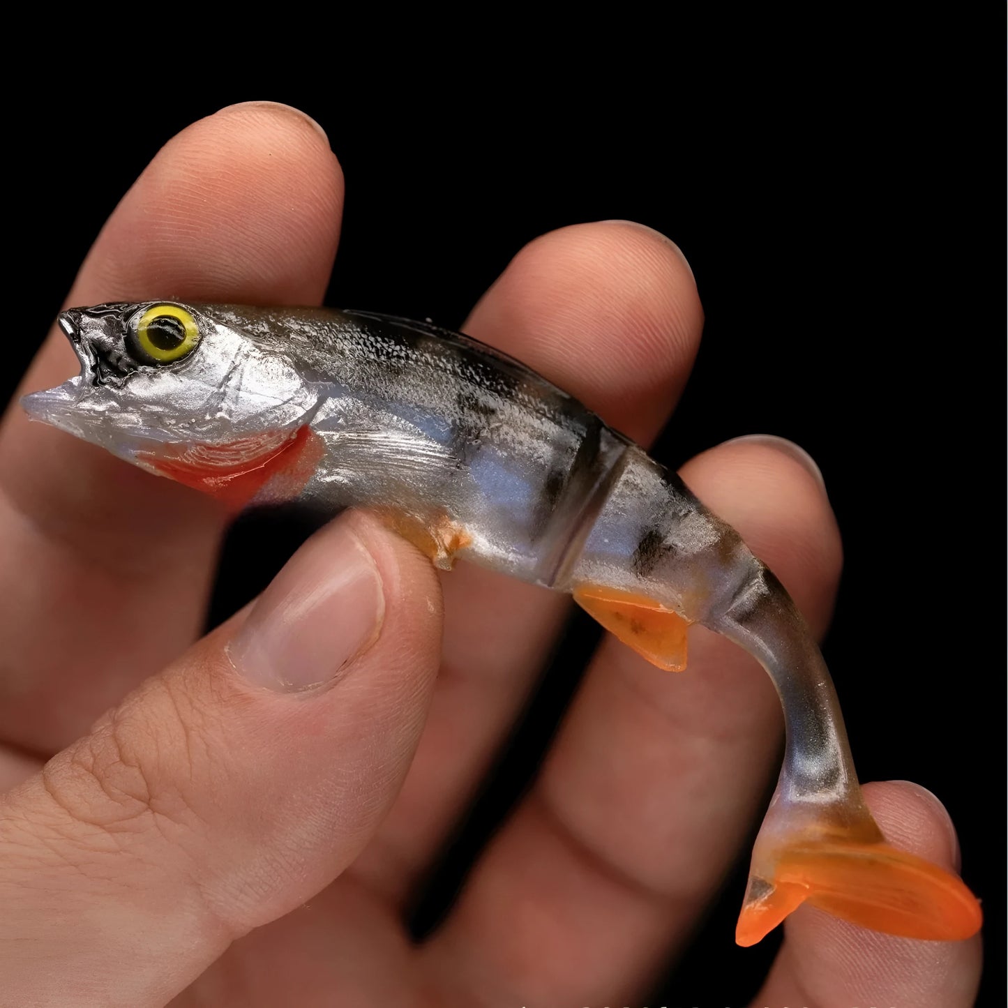 Two Fish T Tail soft plastic fishing lures with scissors-style tails in a natural fish colour pattern