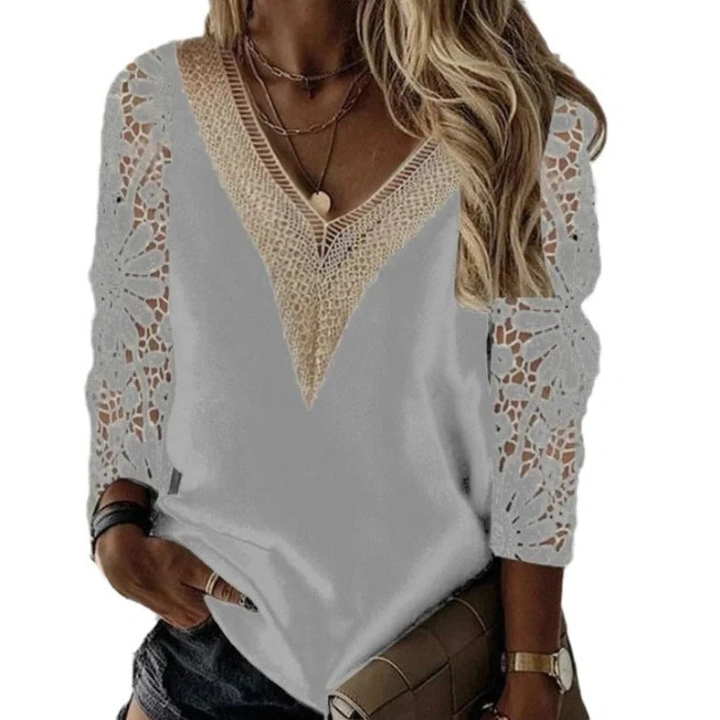Black lace commuter shirt with nine-quarter sleeves and V-neck stitching on hanger