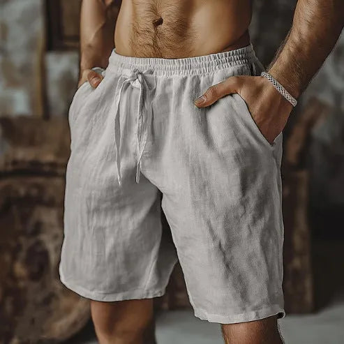 Men's cotton linen beach shorts in straight-leg British style shown in seven colour options
