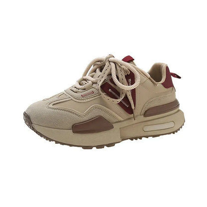 Women's black retro platform sports shoes with round toe and front lace-up fastening.