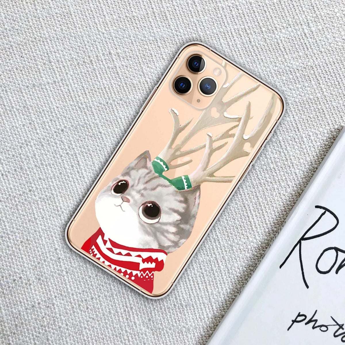 Christmas transparent phone case with festive design for iPhone models, available in eight styles.