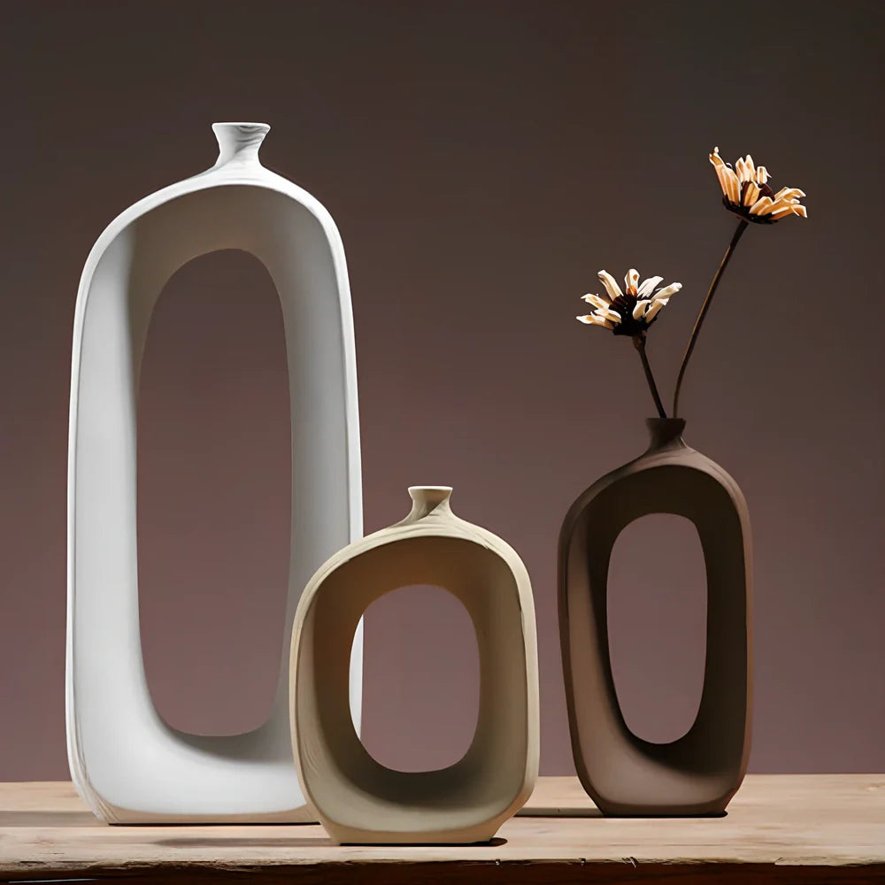 Three white ceramic vases with hand-drawn cloud patterns in 25cm, 20cm, 15cm sizes