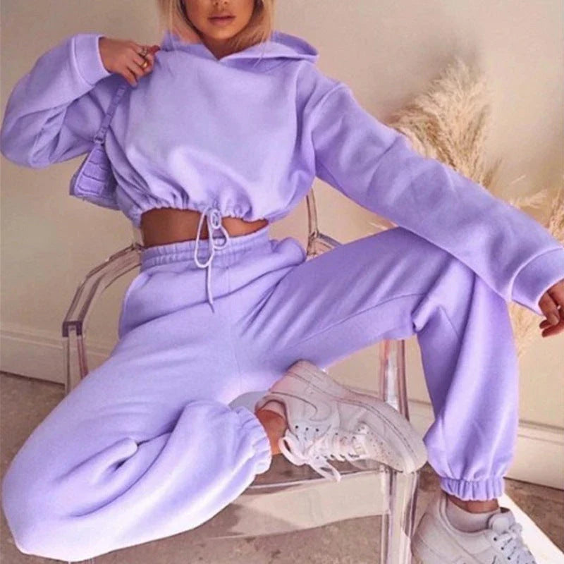 Stylish and comfortable 2-piece tracksuit set for women featuring a hoodie and relaxed-fit pants in a variety of vibrant colors