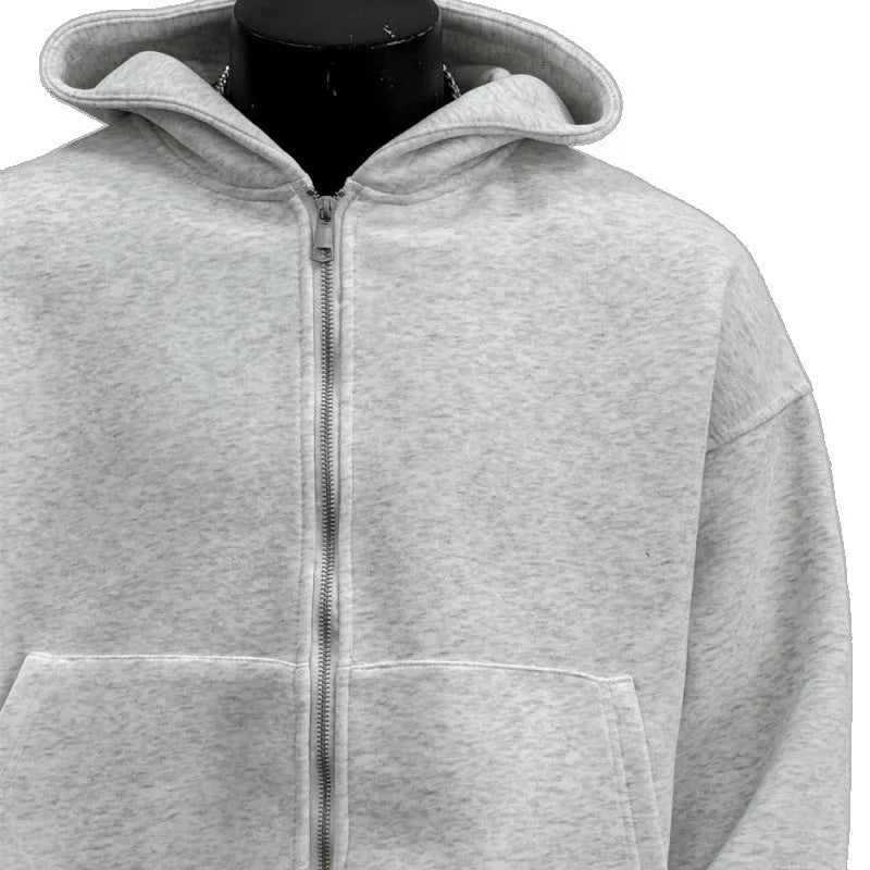 Light grey men's backpack design hooded coat jacket on a hanger.
