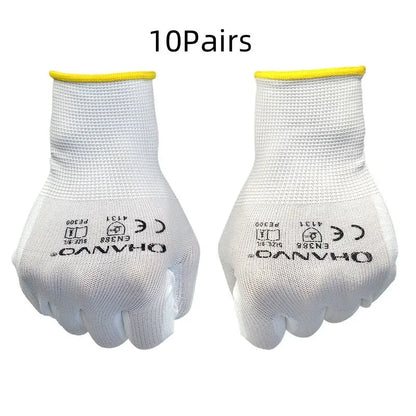 White PU-coated labour gloves showing flexible knit fabric on back and coated palm.