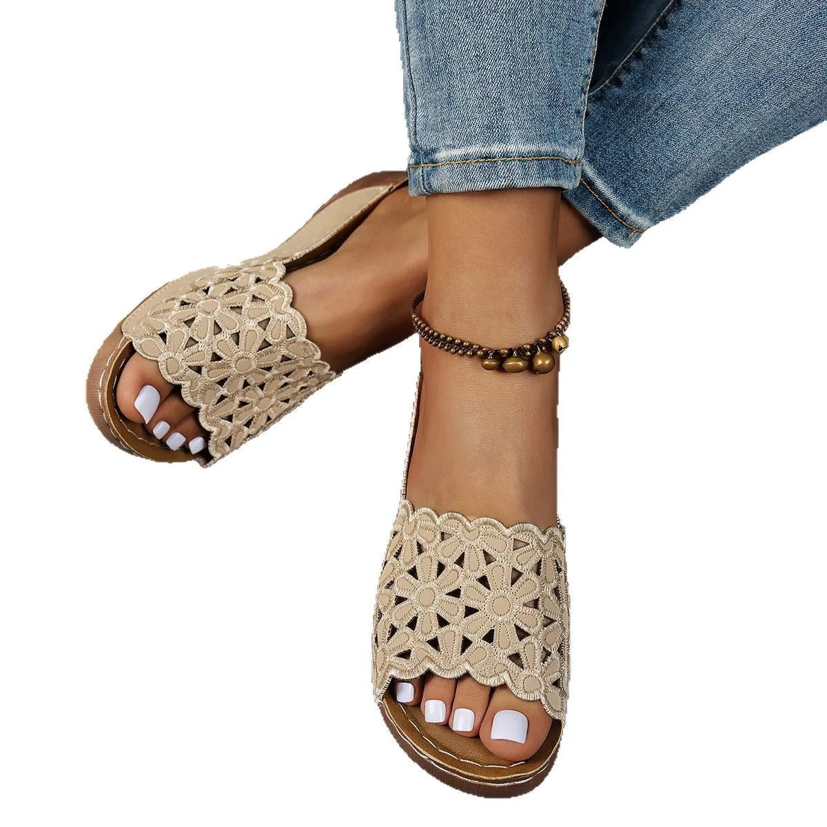 Women's black wedge beach slippers with flower cutout decoration on the PVC upper