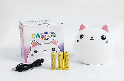 Cute cat-shaped silicone LED lamp with warm white and colourful lighting, measuring 12.5cm