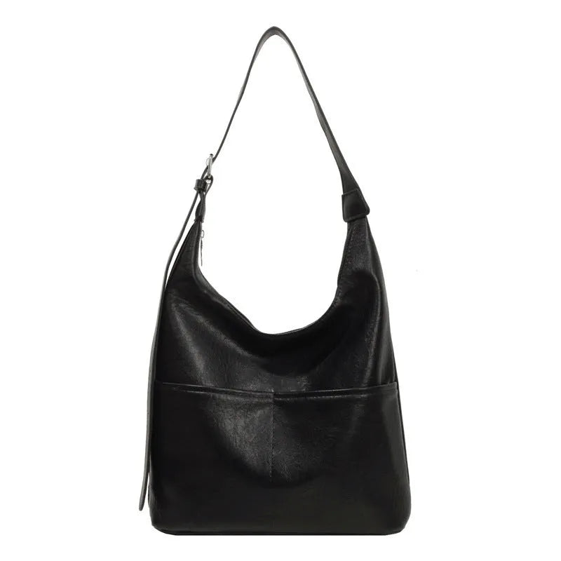 Women's soft PVC bucket shoulder bag with single strap, open pocket, phone pocket, and matching wallet