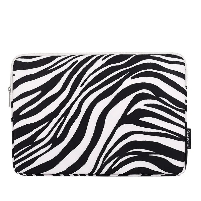 Black and white zebra pattern polyester protective sleeve for a digital notebook, available in 11 to 17 inch sizes