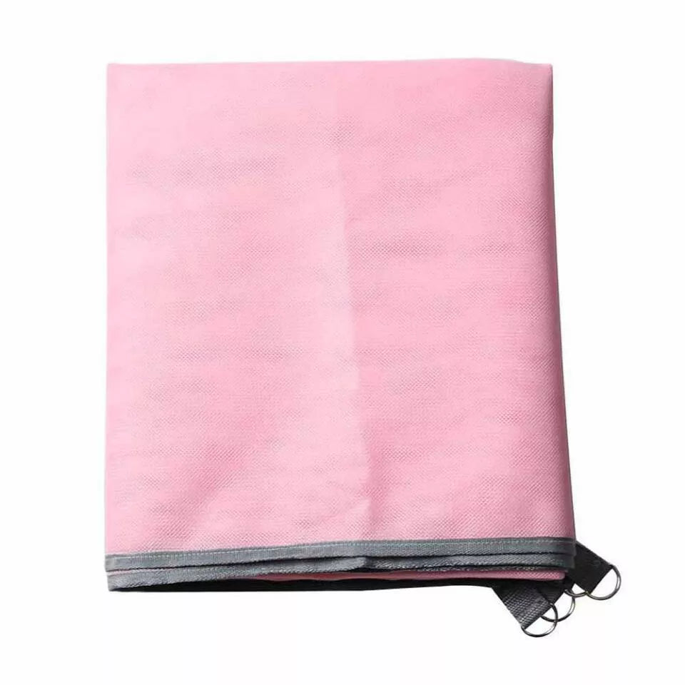 Sand-free beach mat in green, blue, or pink, made from durable PVC for easy cleanup