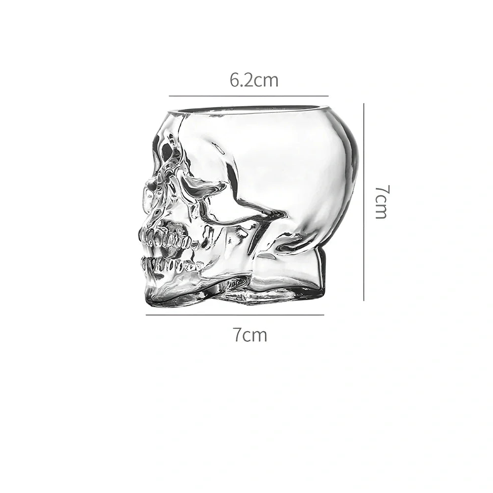 Transparent skull-shaped wine glass with detailed features and 160ml capacity measurement