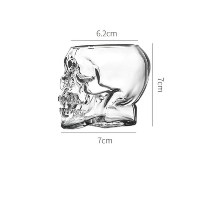 Transparent skull-shaped wine glass with detailed features and 160ml capacity measurement