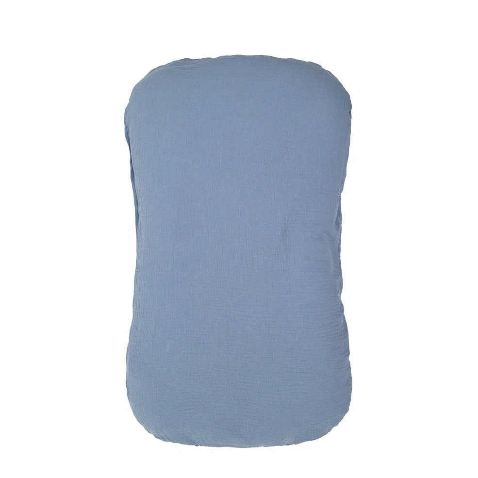 Portable crib with interchangeable fabric cover showing 75x45cm dimensions and multiple colour options