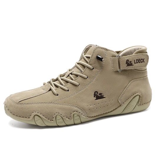High top men's shoes in khaki with rubber soles and microfiber upper, showing round toe and middle tube height