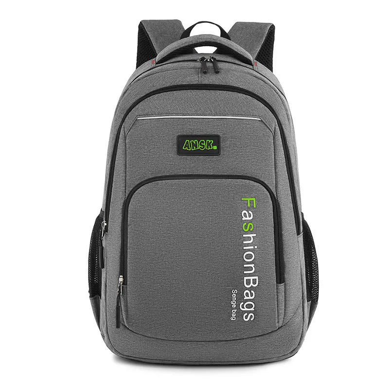 Black nylon street-style backpack with double shoulder straps, shown with open compartment revealing internal laptop sleeve and pockets.