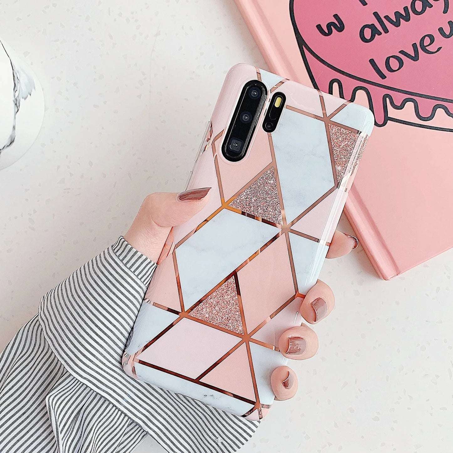 Electroplated marble mobile phone case in various colours for Huawei and Samsung models, showing slim TPU back cover design