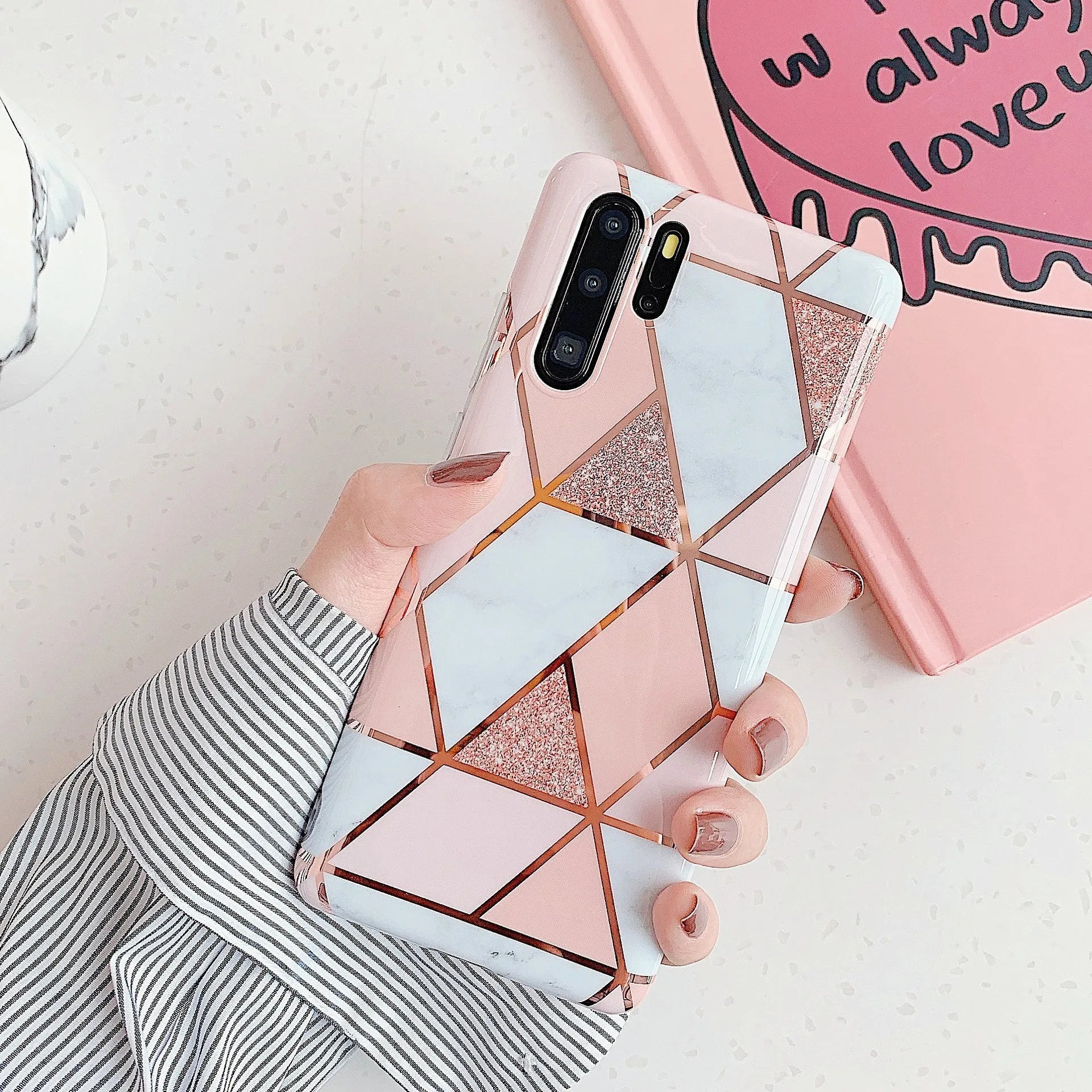 Electroplated marble mobile phone case in various colours for Huawei and Samsung models, showing slim TPU back cover design