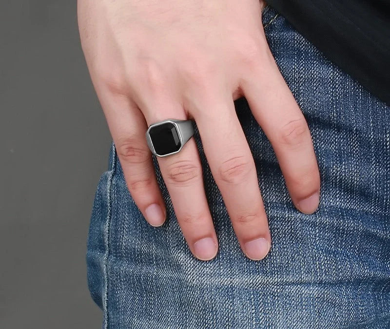 Men's stainless steel black agate ring with geometric design in silver, gold, and red black