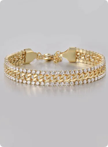 A gold-coloured unisex tennis bracelet with inlaid stones on a titanium steel band.
