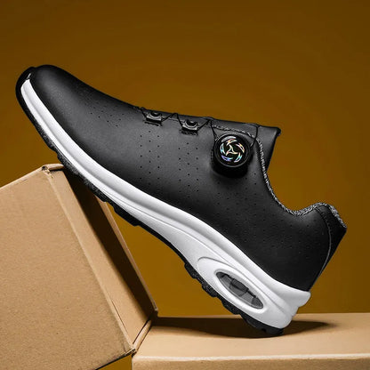 Low-top black mesh casual tennis shoes with cross shoulder straps and white composite sole