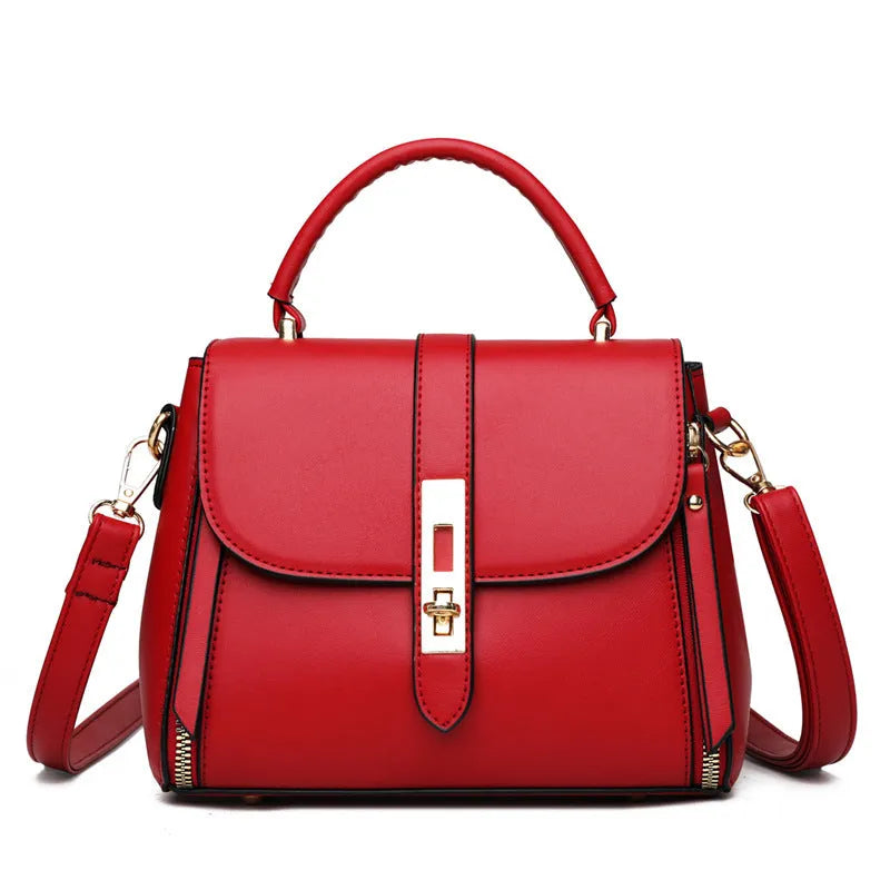 Women's soft black PU leather vertical messenger bag with adjustable strap, showing interior polyester lining.