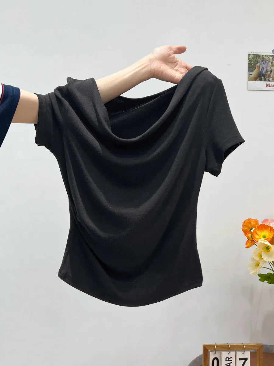 Women's one-shoulder draped neckline short sleeve top in slim fit with pleat detail, shown in Apricot