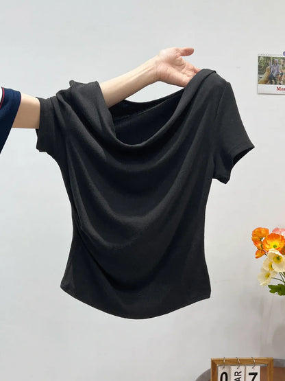Women's one-shoulder draped neckline short sleeve top in slim fit with pleat detail, shown in Apricot