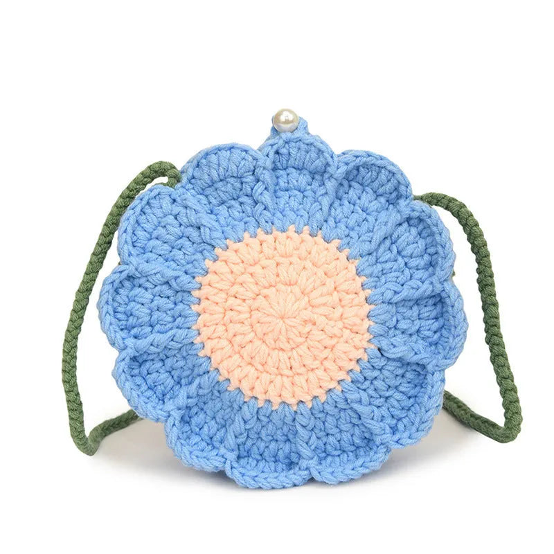 Hand-woven round bag with wool crochet flowers and cotton lining