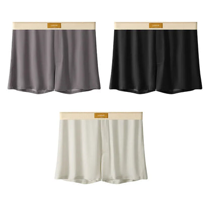 Men's loose-fit Ice Silk nylon underwear in a three-pack, showing colour options like black, green, and grey.