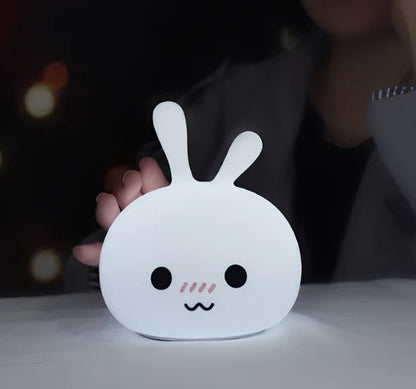 Marshmallow Bunny LED night light with shy and happy face expressions, 126x126x147mm dimensions