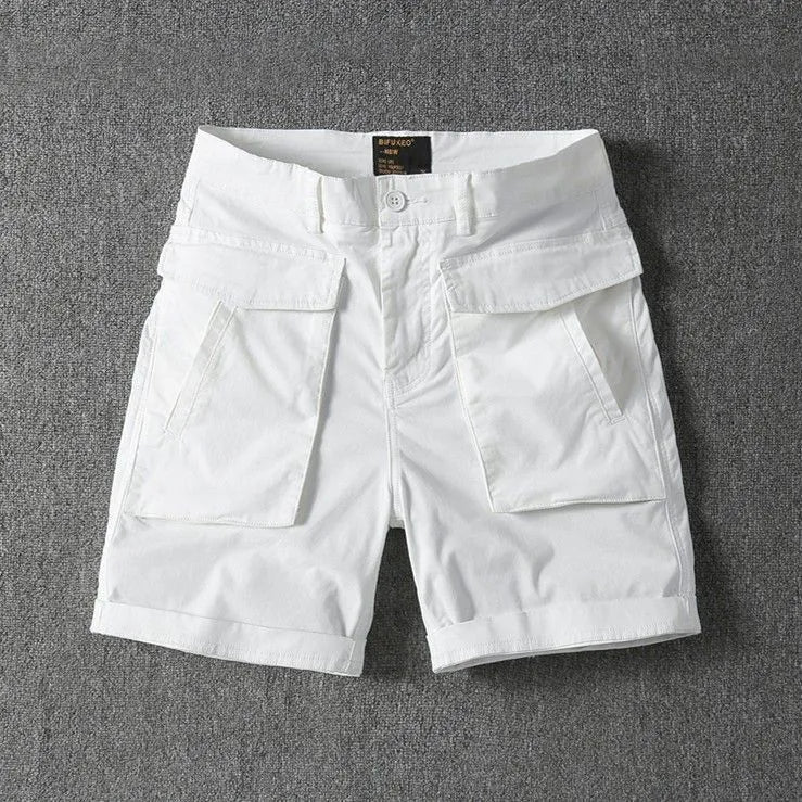Men's straight-leg cargo shorts in Army Green with multiple pockets, showing micro-elastic cotton fabric detail