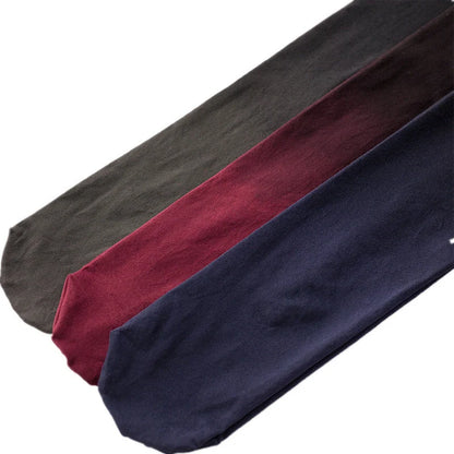 Stylish gradient transition pantyhose in black, navy blue, and wine red colors, showcasing the versatile and fashionable design.