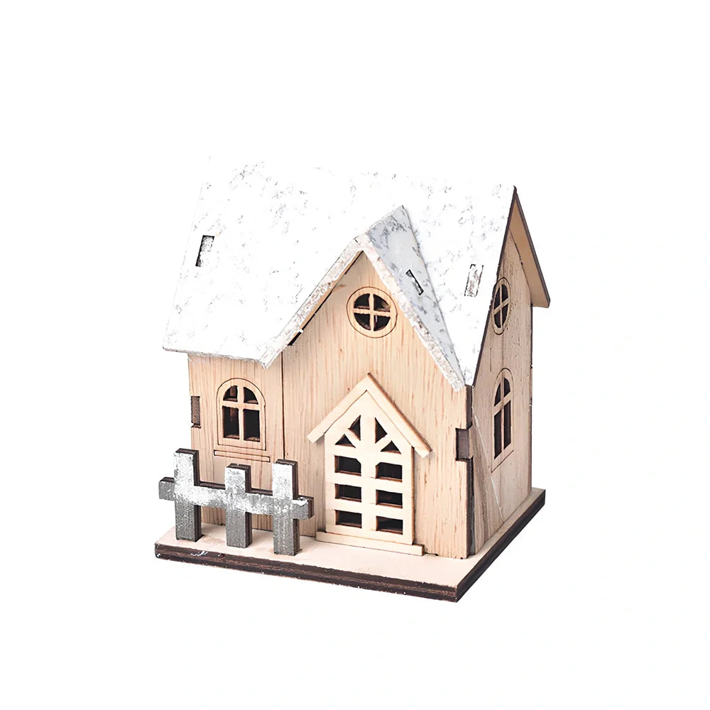 LED illuminated wooden Christmas cabin measuring 8cm by 7cm by 9.5cm with festive lighting