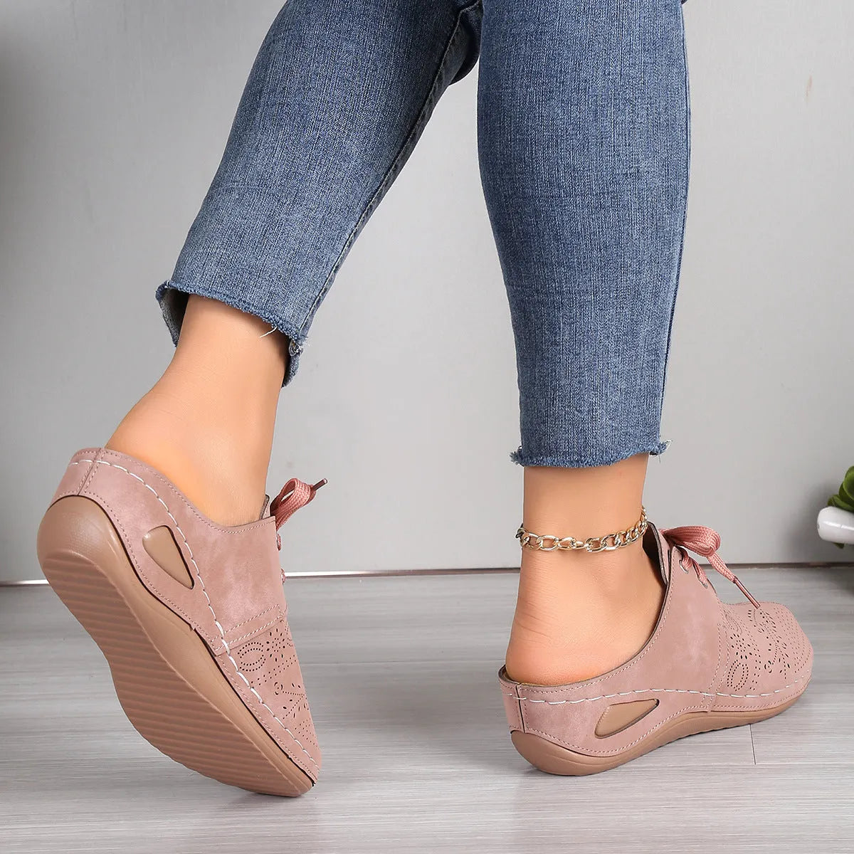 Women's summer lace-up slippers with hollow-out wedge design in black, suede upper, and rubber sole