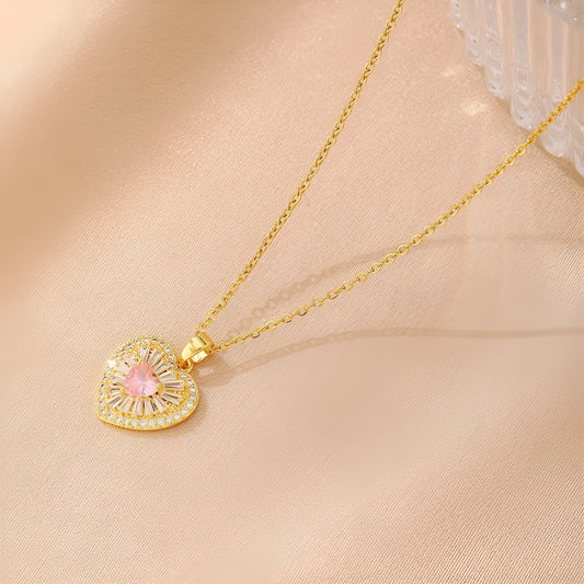 Women's gold electroplated copper necklace showing four pendant options: heart, butterfly, cross and round diamond