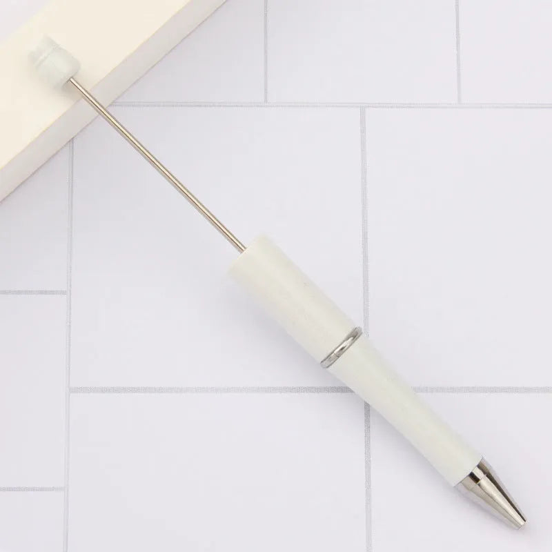 Rotating bead ballpoint pen in gradient colour with ABS plastic and steel wire construction