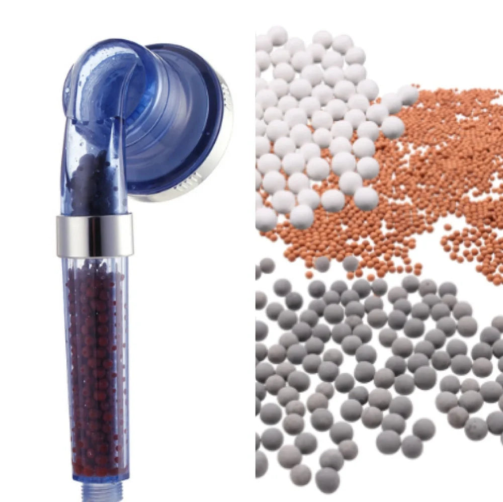 Pressurised shower head with stainless steel panel showing three water mode settings and removable nozzles