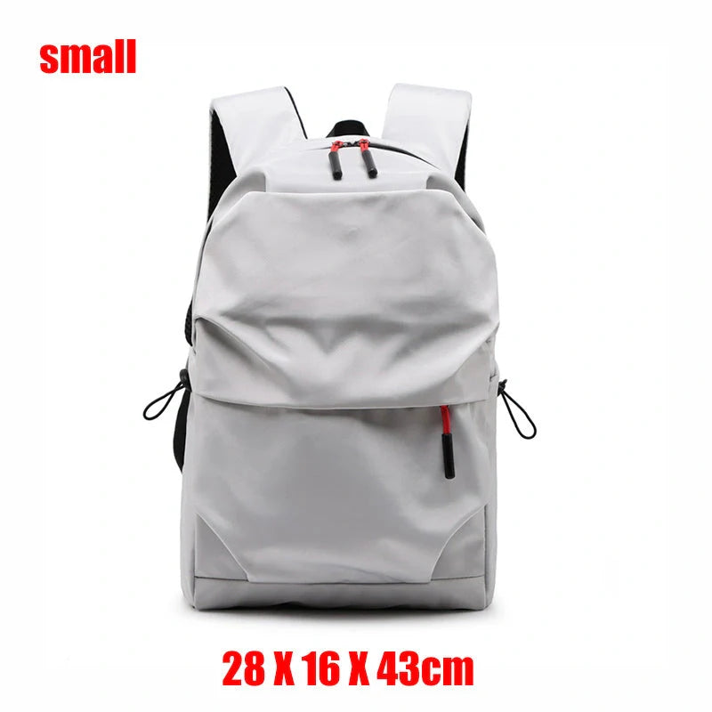 Sleek and durable nylon backpack with spacious compartments for everyday use.