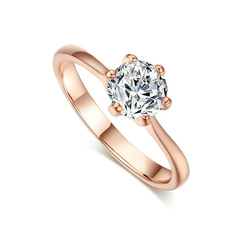 Exquisite rose gold and zircon cocktail ring with intricate geometric design and sparkling zircon gemstones