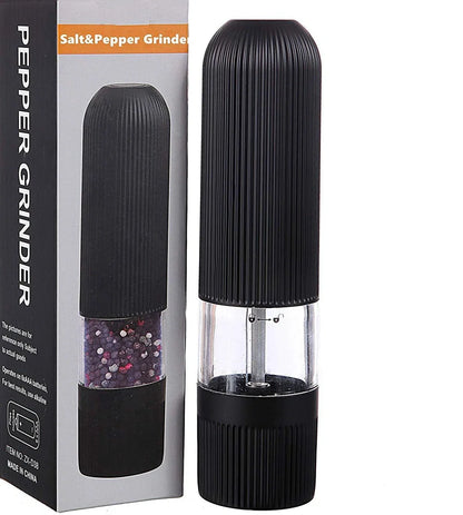 Black electric pepper grinder with transparent section showing peppercorns and ceramic grinding mechanism