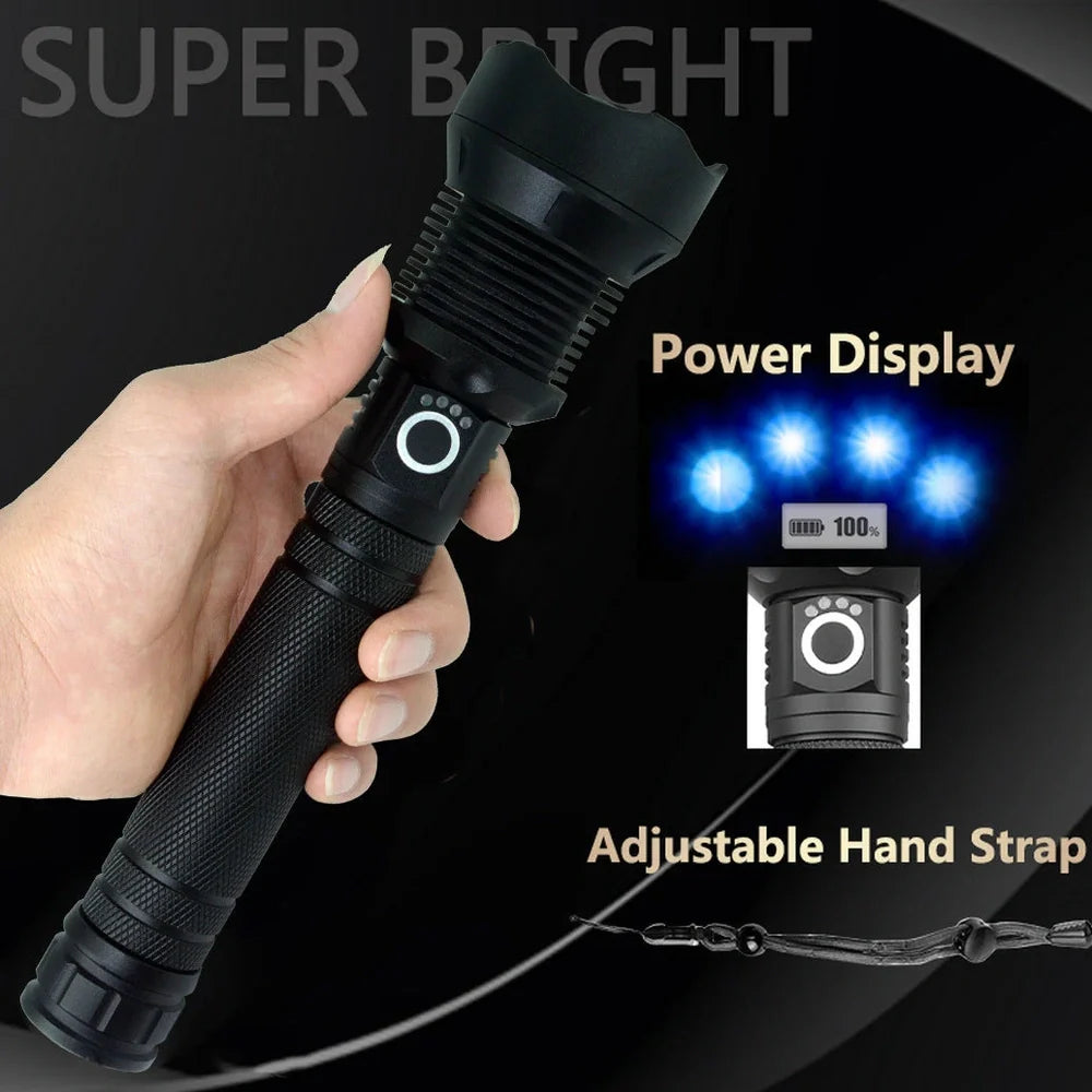 Black aluminium USB rechargeable flashlight with telescopic zoom, showing extended and retracted positions