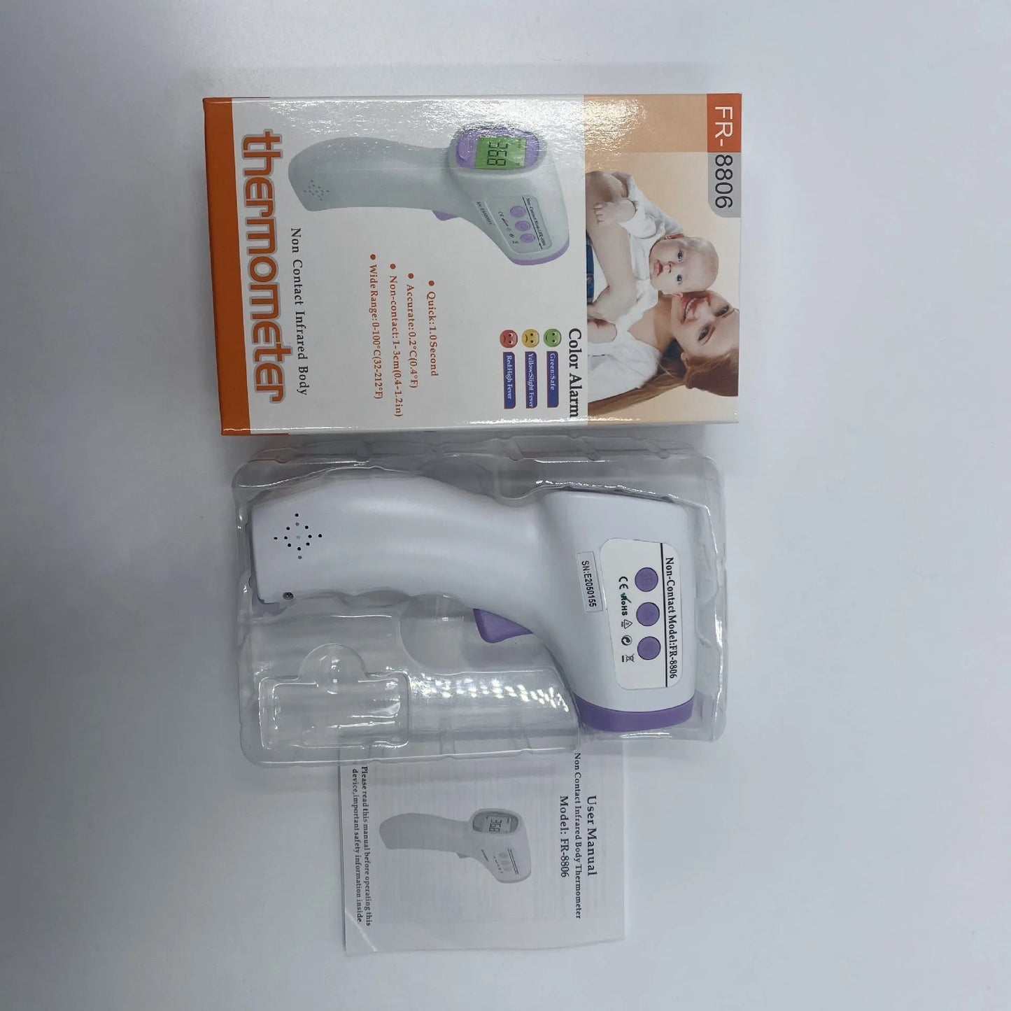 White digital infrared thermometer with LCD screen displaying temperature and colour-coded fever alert.