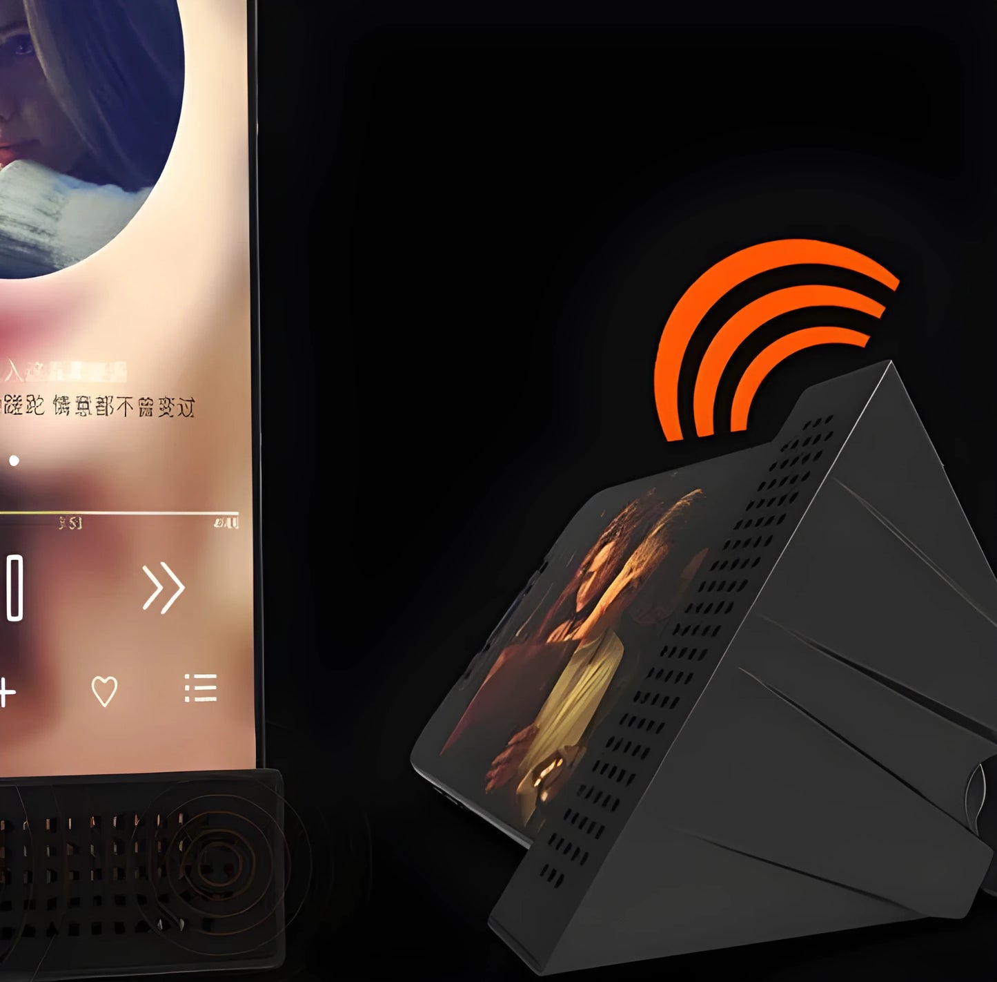 Portable black ABS plastic phone amplifier bracket holding a smartphone on a desk.