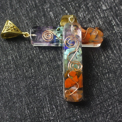 A stylish 7-chakra crystal pendant featuring a unique geometric design and natural stone patterns