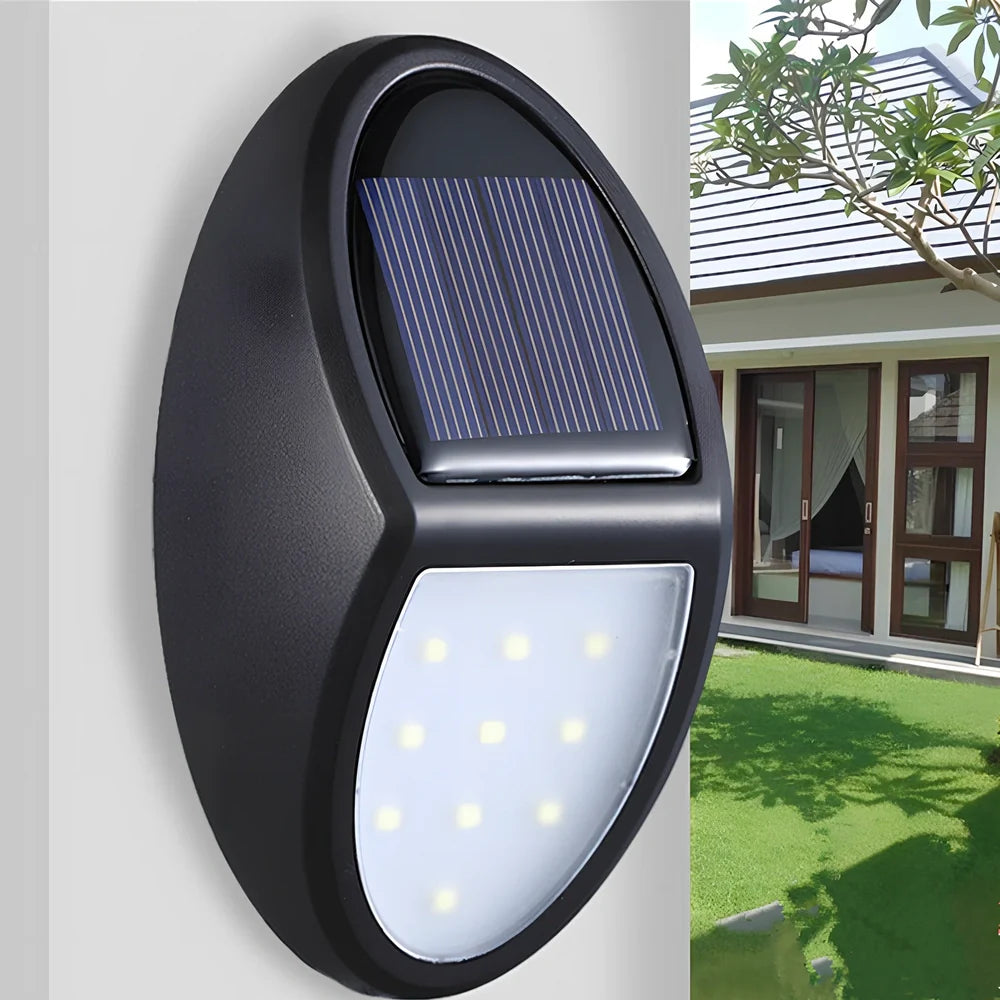 Black LED solar wall light with solar panel and 2835 lamp beads for outdoor illumination